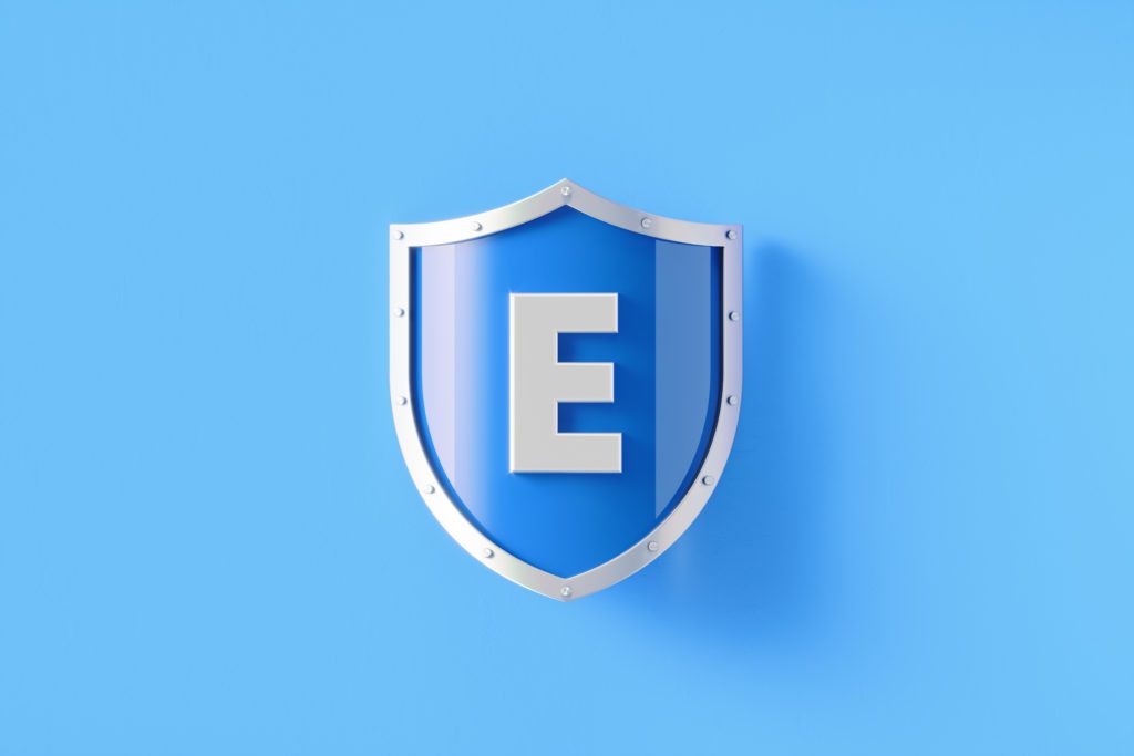 Silver shield with letter E sitting on blue background